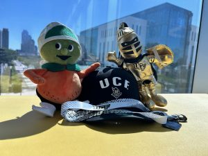 Image of UCF Fan Package that includes Citronaut Plush, Knightro Plush, UCF Hat and UCF Lanyard